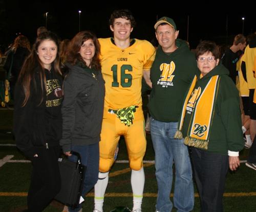 The Pesicka family at a football game:  Aubrey, Ms. Pesicka, Austin, Mr. Pesicka and MaryAnn Meyers (Ms. Pesicka's Mom.) 